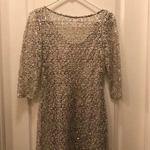 Silver knee length, 3/4 sleeve sequence dress